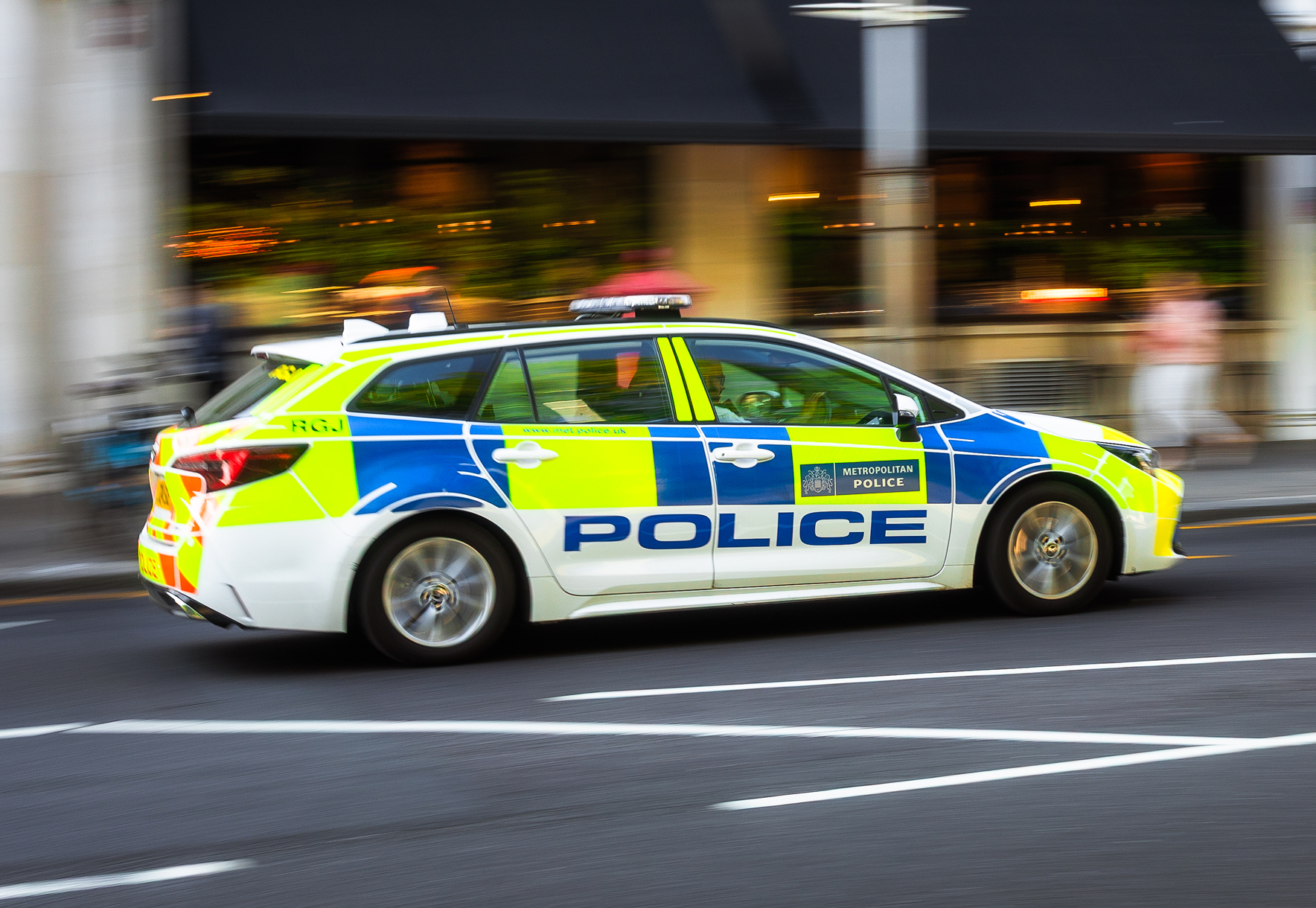 Police car with blurred background.