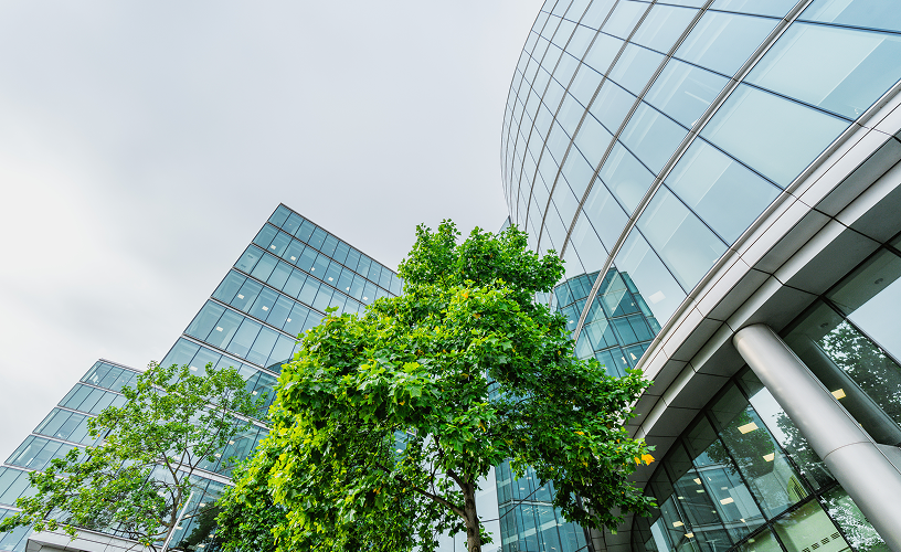Upward angle of the outside of an office building.